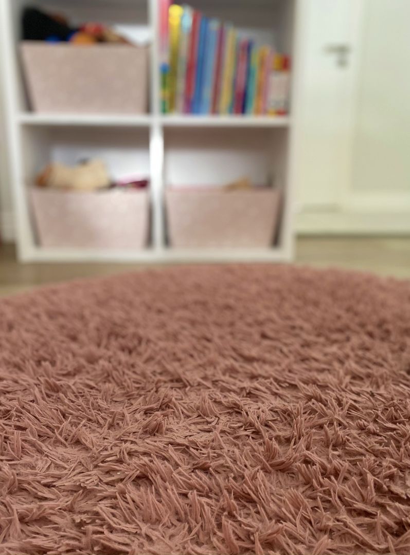 Come passare l'aspirapolvere su un tappeto di lana shag