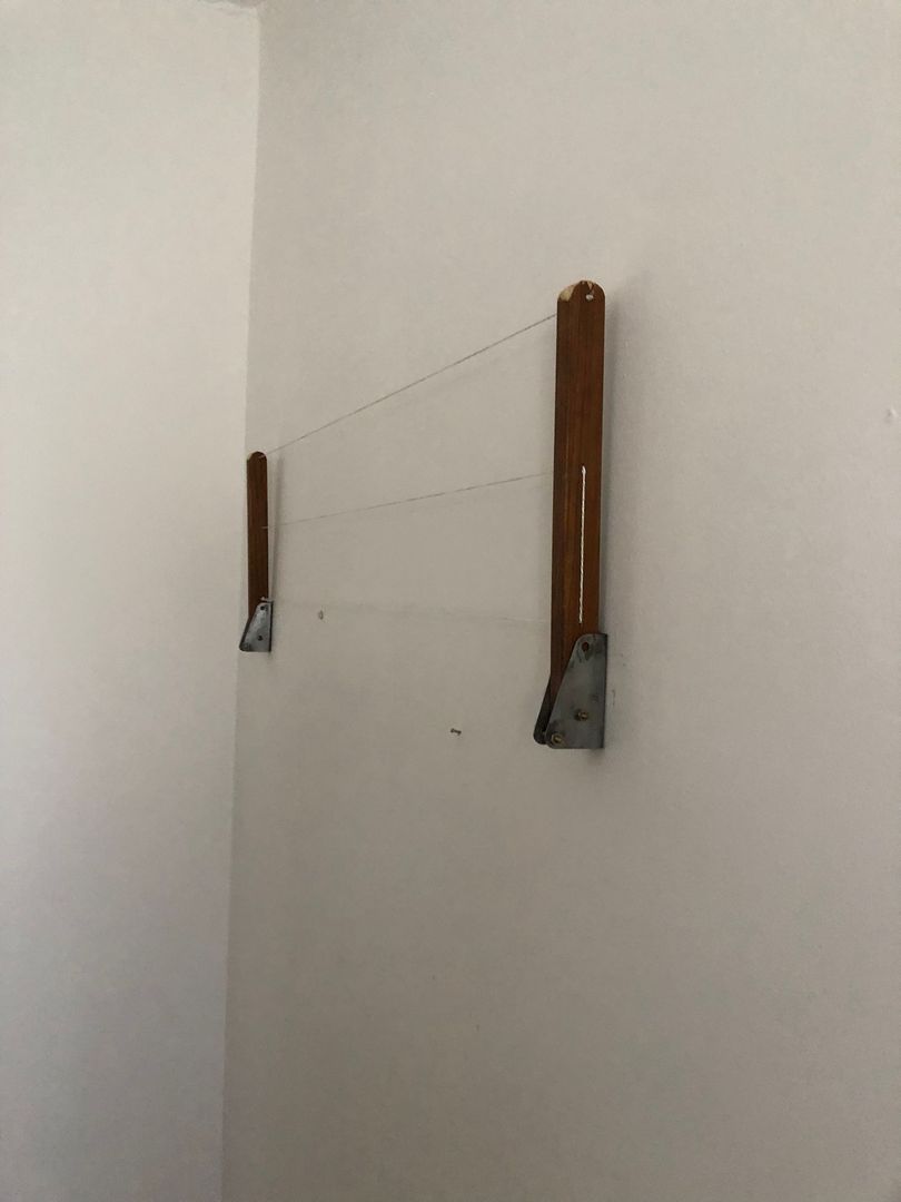 Cómo hacer un tendedero plegable para el muro 