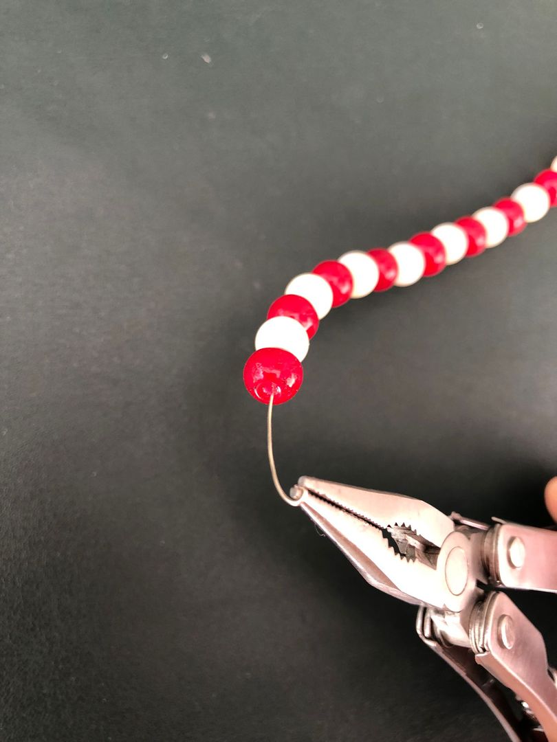 Adım 3: Telin ucunu bükün