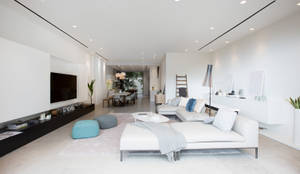 It's all about communication:  Living room by Sensearchitects Limited