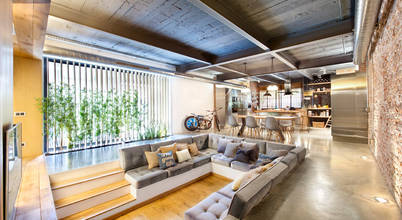 Bajo comercial convertido en loft (Terrassa), Egue y Seta Egue y Seta Rustikale Wohnzimmer