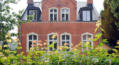 Sanierung in Berlin Nailis Architekten Einfamilienhaus Ziegel Rot