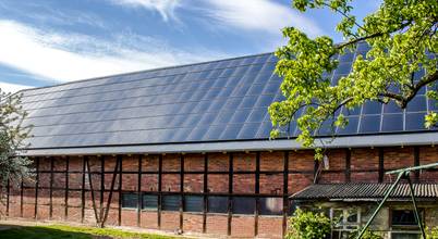 Gebäudeintegrierte Photovoltaikanlage auf denkmalgeschützter Scheune Architektur- und TGA-Planungsbüro Carsten Grobe Passivhaus Dach