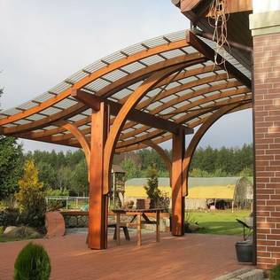 Jardins  por EcoCurves - Bespoke Glulam Timber Arches