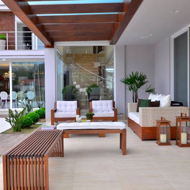 Residencial Unifamiliar: Terraços por Marcelo John Arquitetura e Interiores