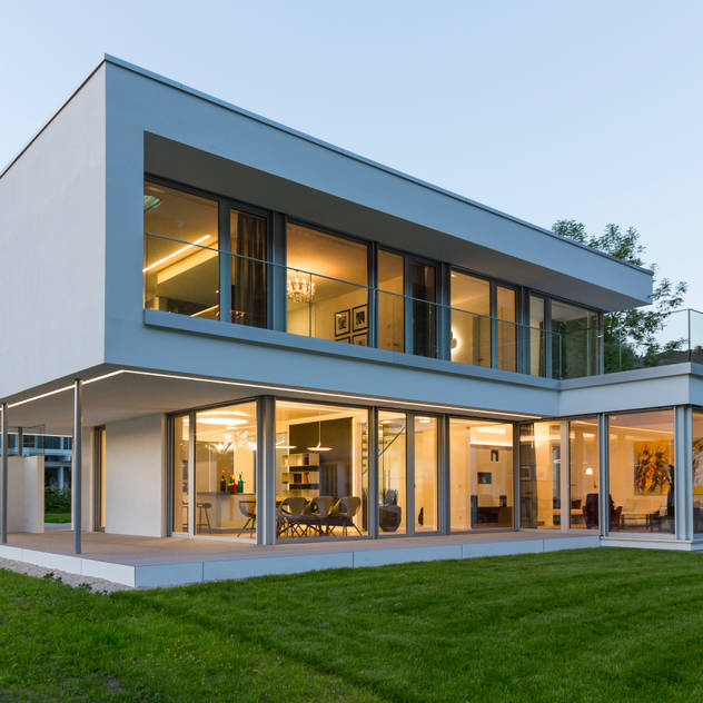 Casas unifamiliares de estilo por ARKITURA GmbH