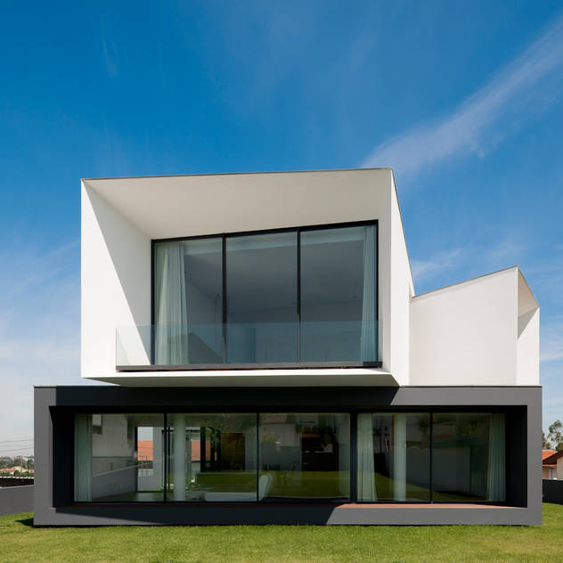 Casa S. Roque: Casas minimalistas por Urban Core