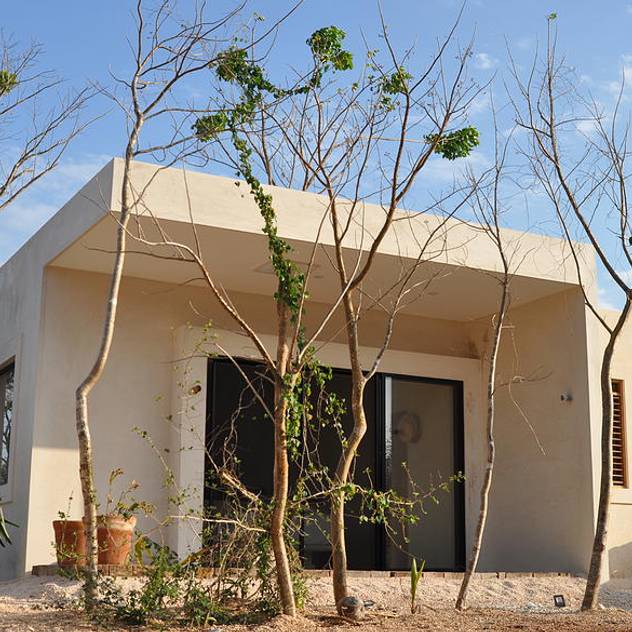 Casas de estilo tropical por Degetau Arquitectura y Diseño