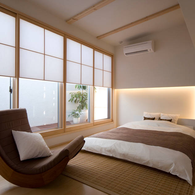 凛椛Classic: 一級建築士事務所　株式会社KADeLが手掛けた寝室です。