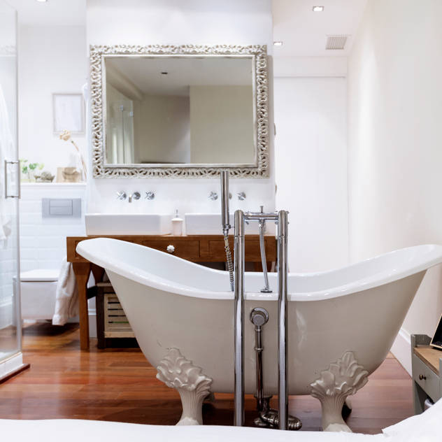 Reforma de piso: Baños de estilo clásico de ANTIOQUIA INTERIORISMO