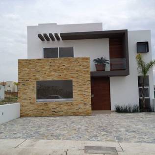 Fachada : Casas de estilo moderno por SANTIAGO PARDO ARQUITECTO