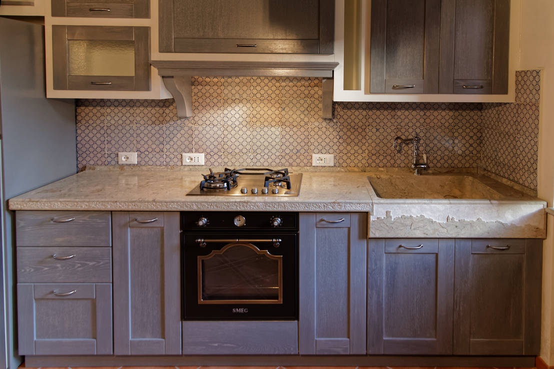 Cucina rustica con lavello e piano cucina in pietra | homify