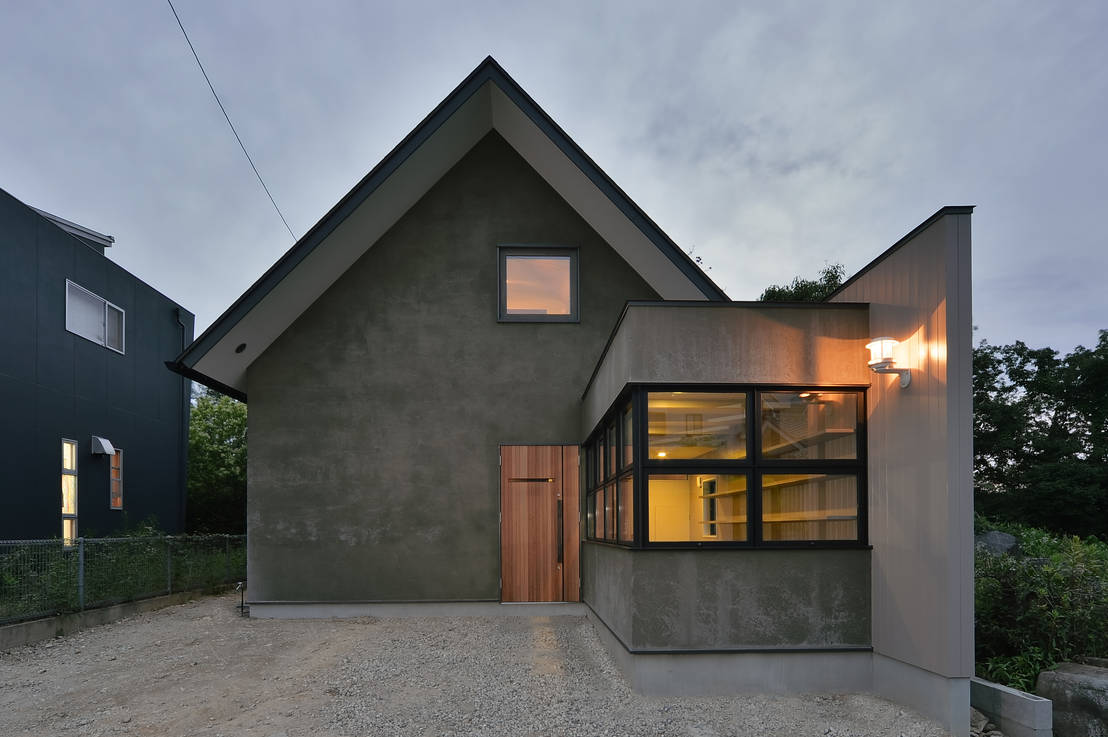 A Cool Concrete House Made Warm With Wood