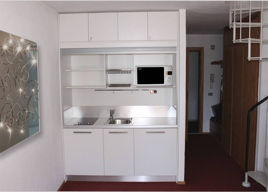 Mini cucine minisize e letti a scomparsa monolocale in montagna ...