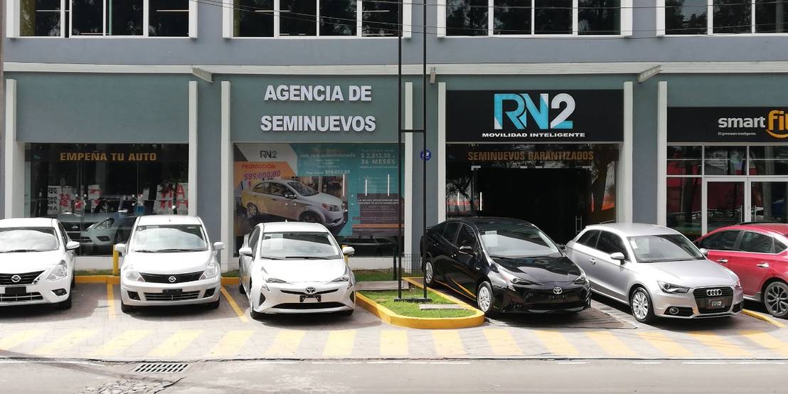 Diseño de Agencia de autos y oficinas homify