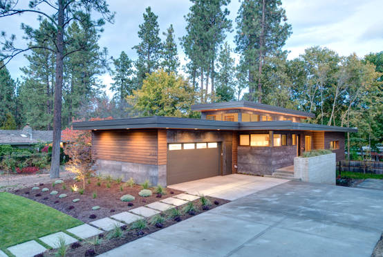 Una casa de piedra y madera para la familia moderna | homify