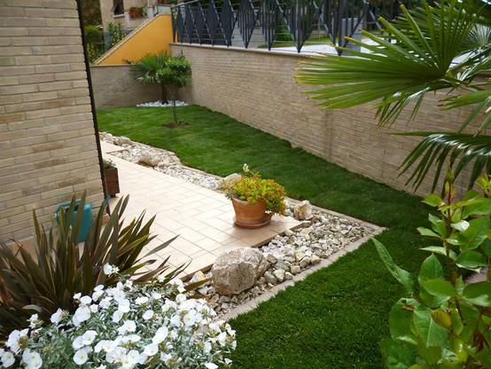 18 ideas geniales para renovar un pequeño patio sin gastarte una