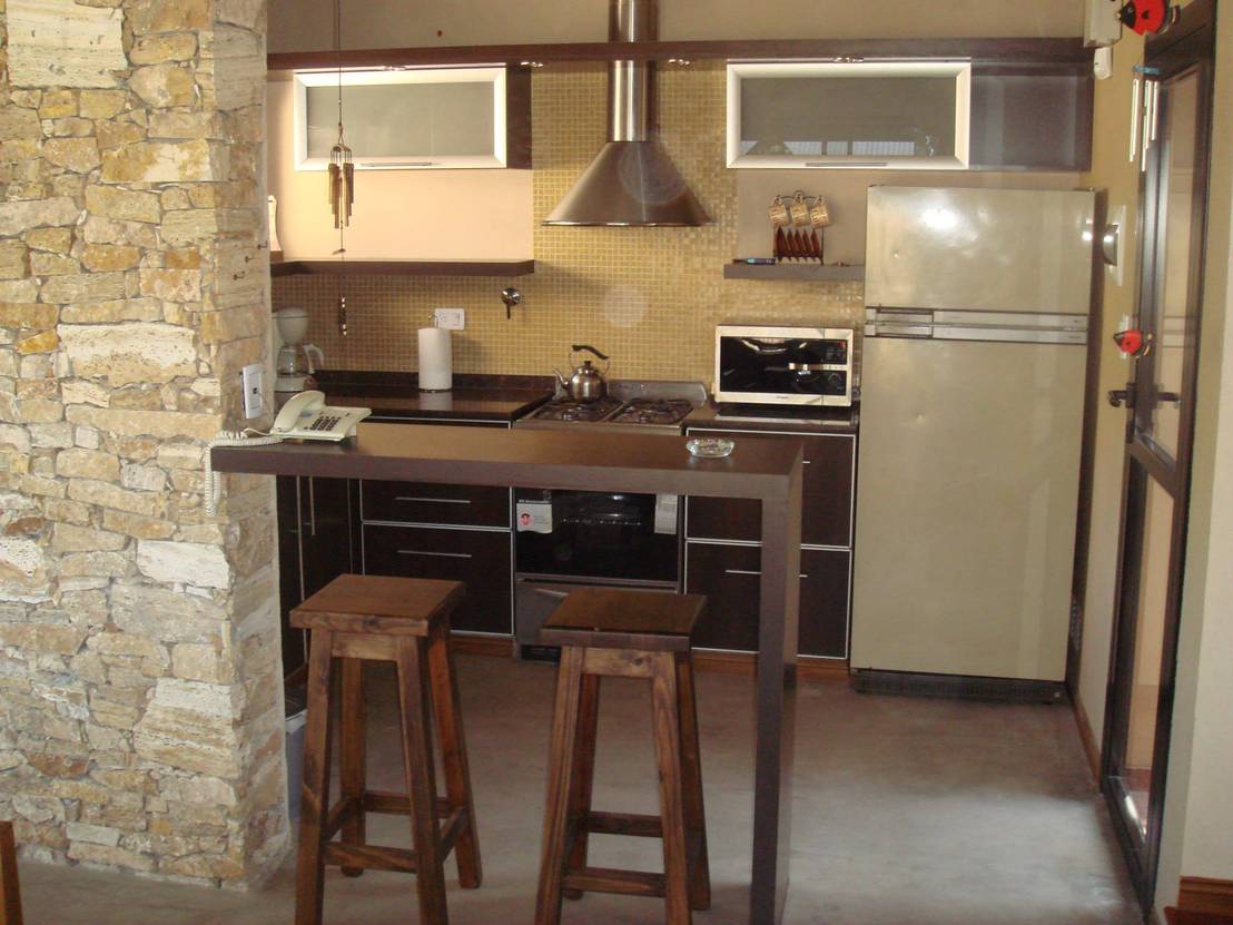 tiny kitchen with breakfast bar