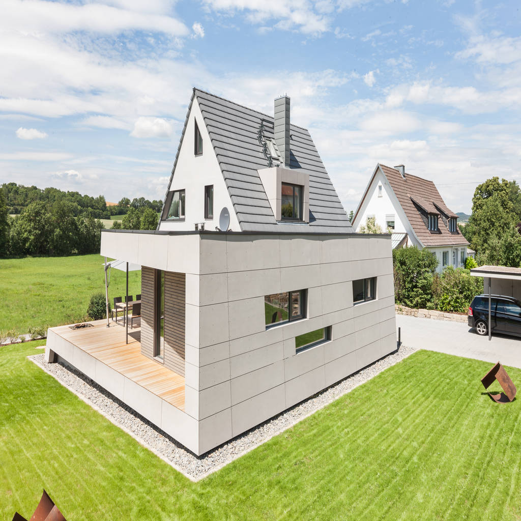 Anbau angelehnt an den bestand moderne häuser von wukowojac architekten