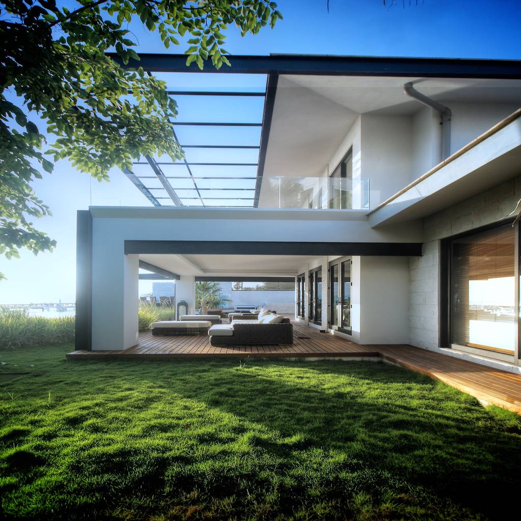 Terraza planta baja balcones y terrazas de estilo moderno de sanzpont
