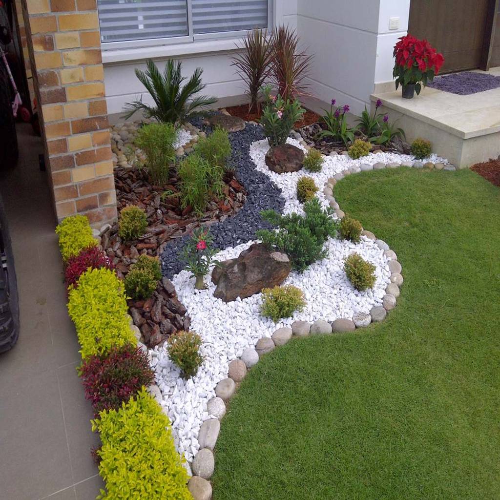 29 meravigliose idee per un giardino piccolo Aiuole da giardino con sassi