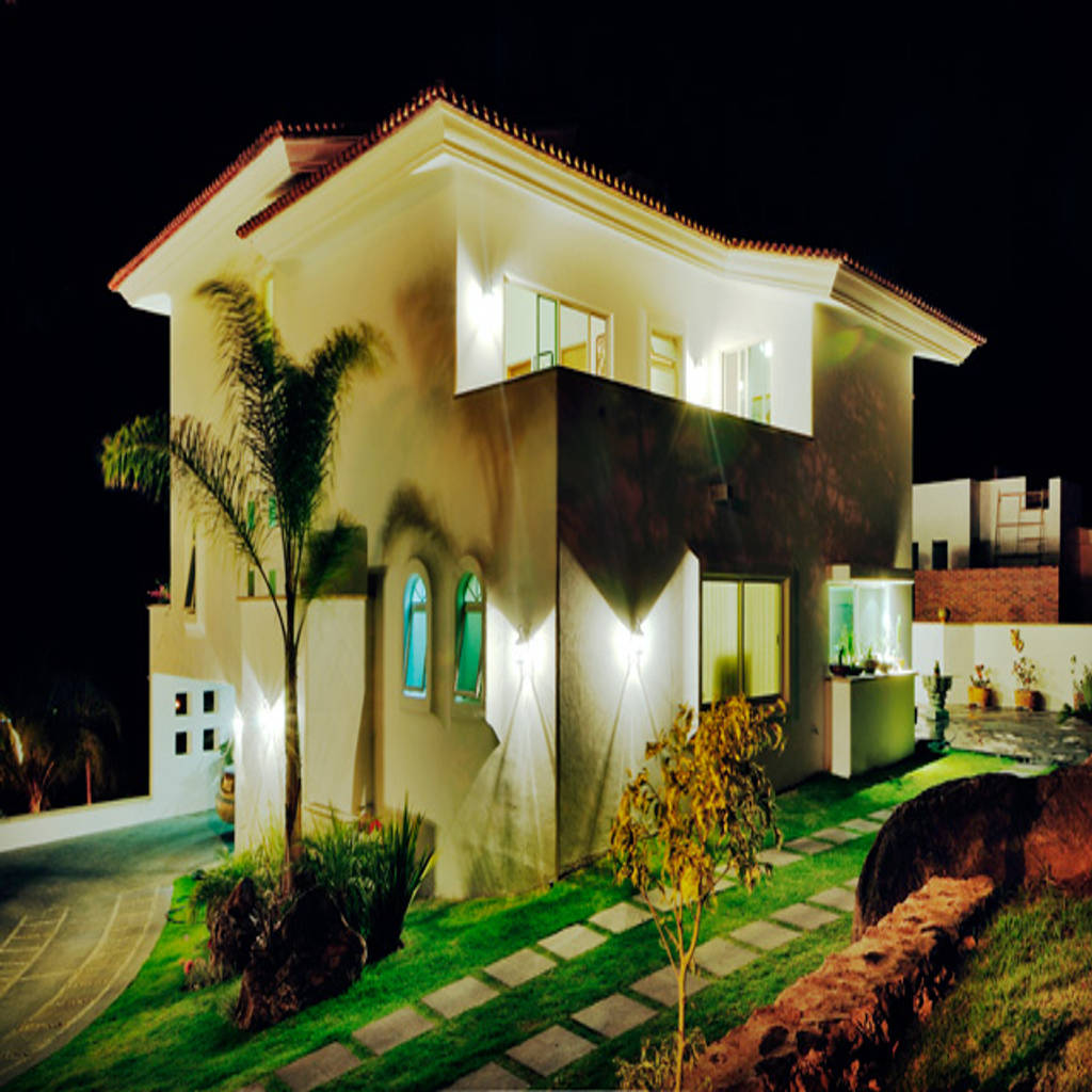 Fachada nocturna excelencia en diseño casas coloniales concreto blanco