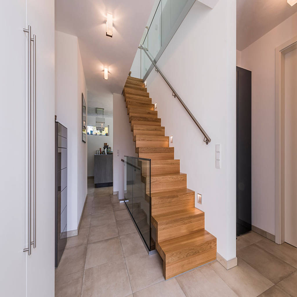 Einläufige faltwerktreppe und gläsernem brüstungsgeländer homify