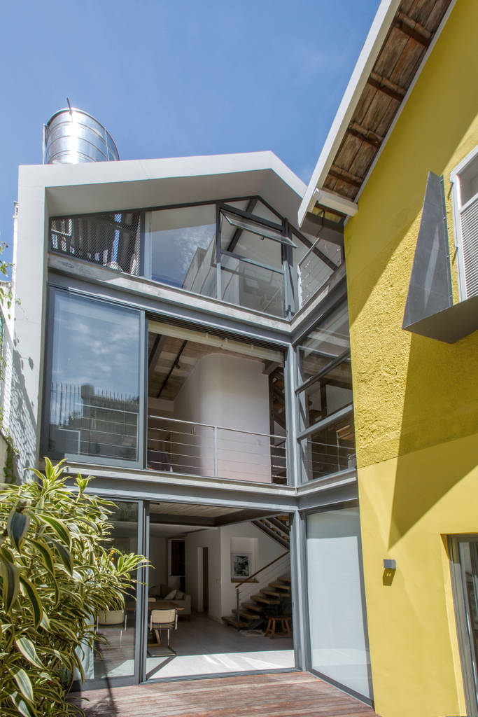 Retrofit De Residencia No Humaita Por Baumann Arquitetura Moderno Metal Homify