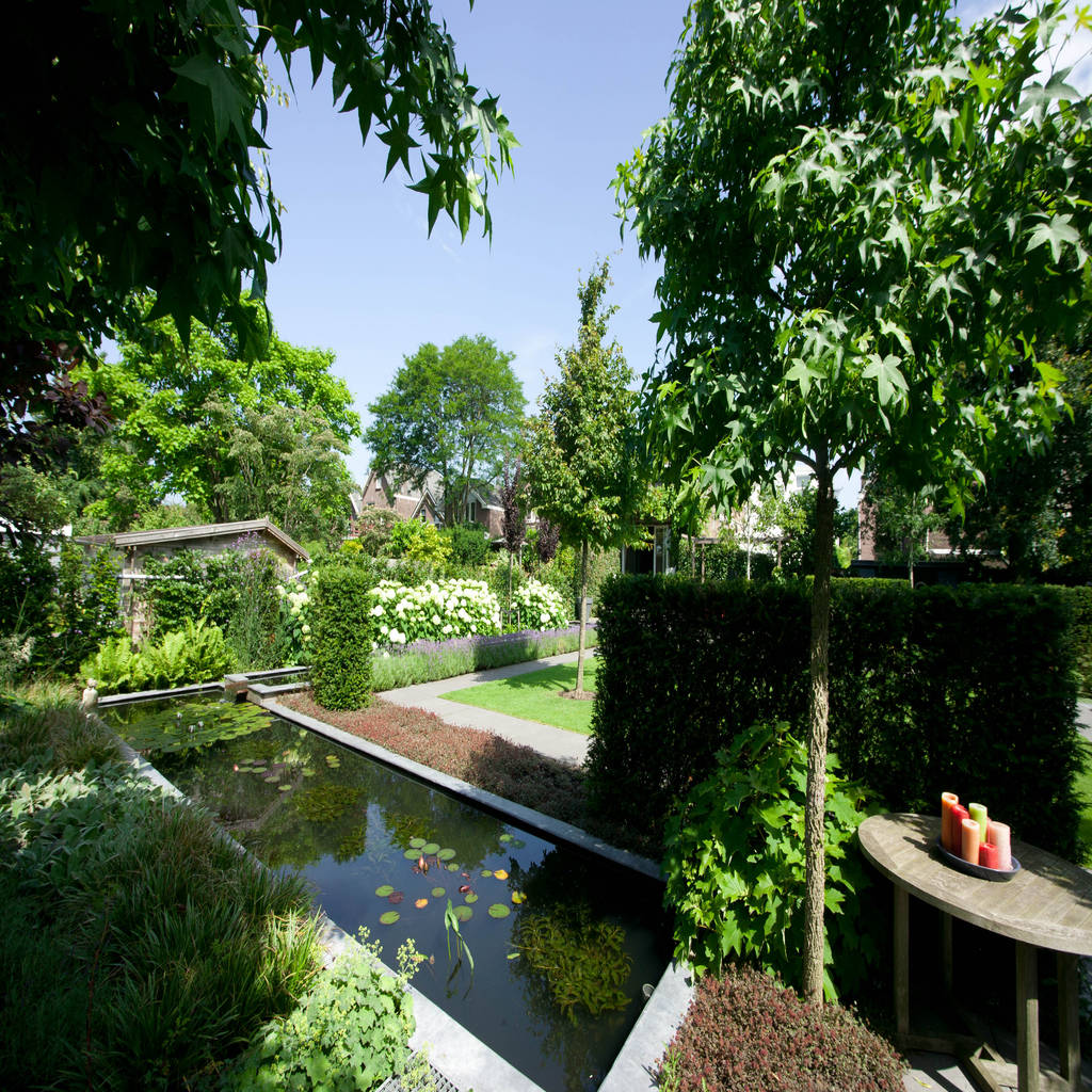 Mooie privé tuin met waterpartij groengroep b.v. moderne tuinen homify