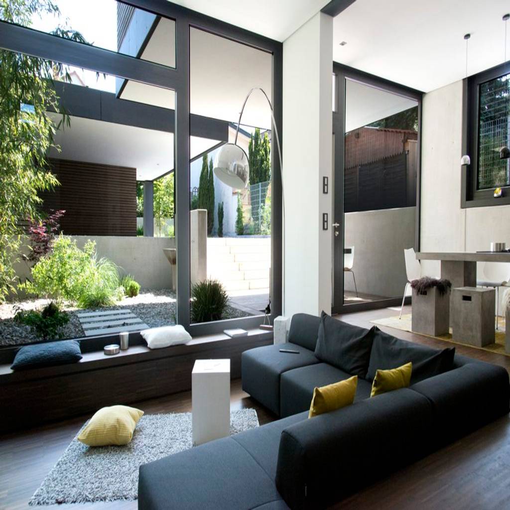 Offener Wohnbereich Mit Blick Zum Garten Und Garage Moderne Wohnzimmer Von Herrmann Massivholzhaus Gmbh Modern Massivholz Mehrfarbig Homify