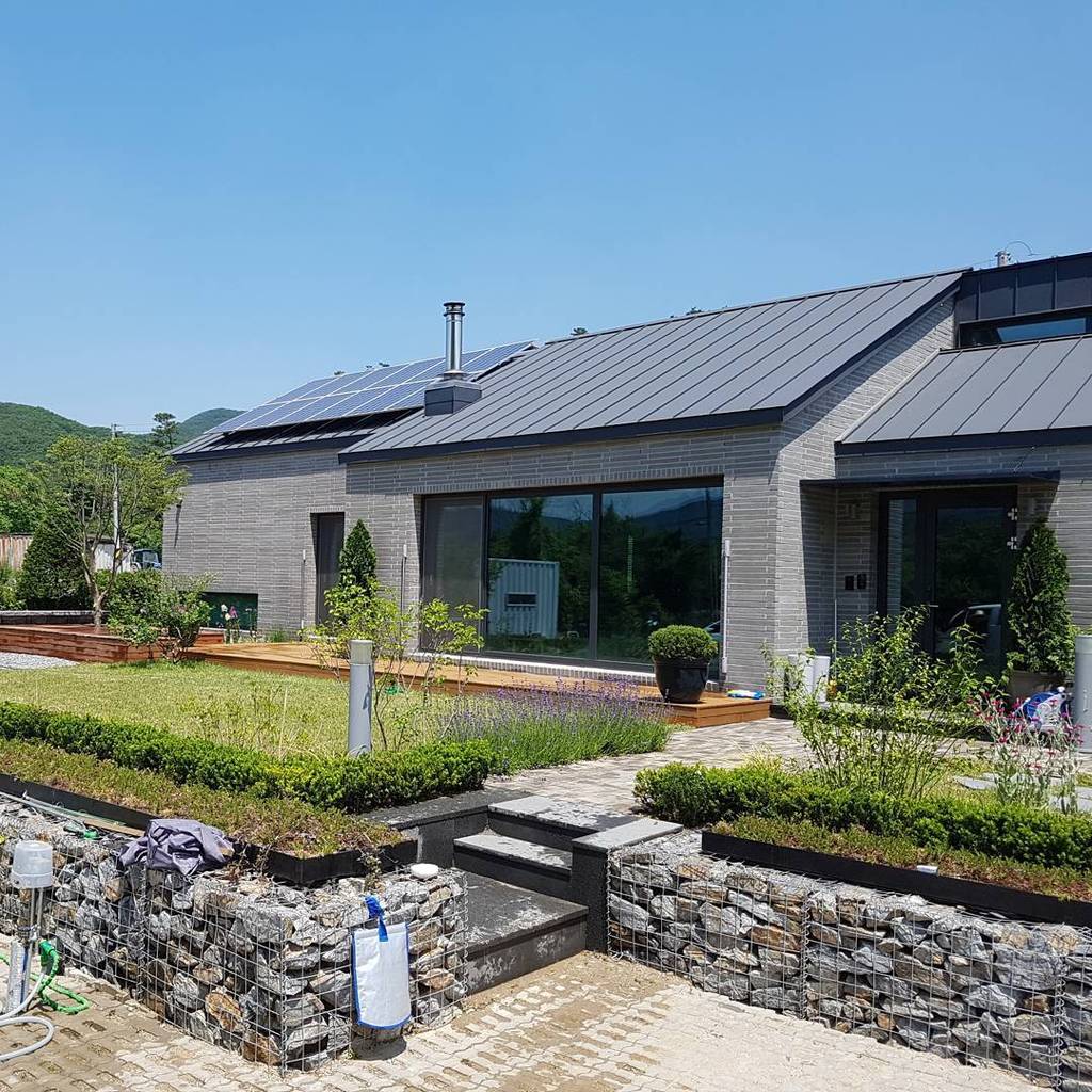 아키프레임 건축사사무소 casas de campo ladrillos gris | homify