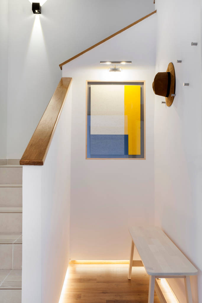 Reforma y amueblamiento en sótano de vivienda unifamiliar adosada en