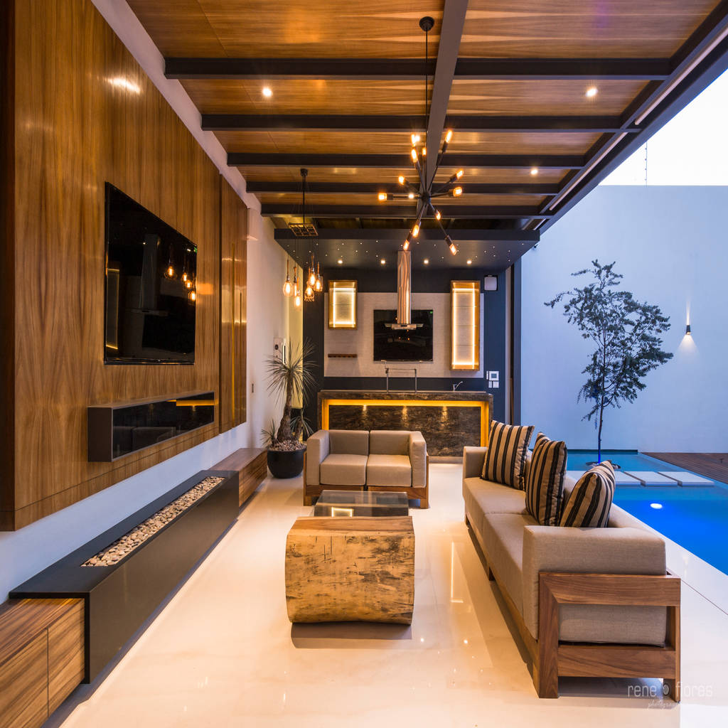 Terraza con cantina-bar y asador rené flores photography balcones y