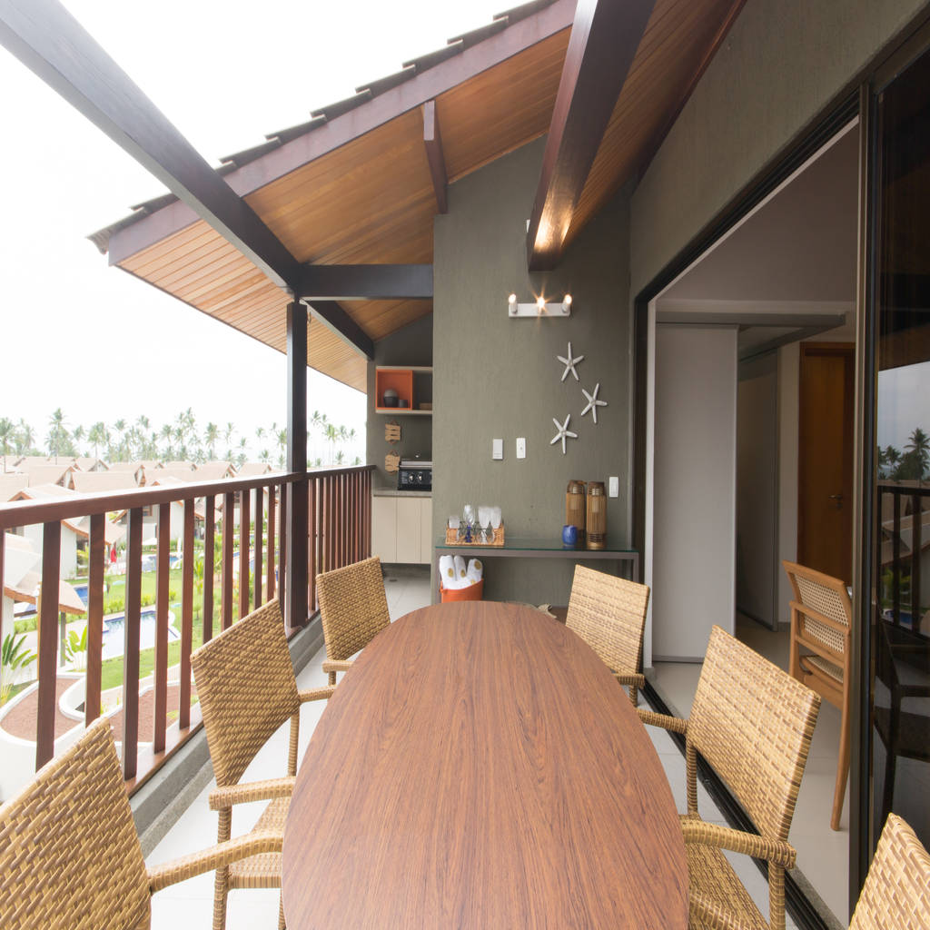 Varanda varandas alpendres e terraços tropicais por estudio noi arquitetura tropical madeira