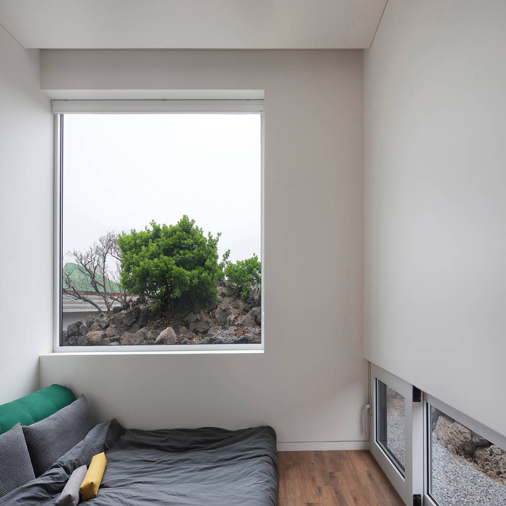 Guest room: 백에이어소시에이츠의  방 | homify