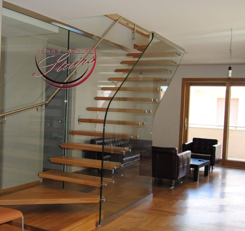 cantilever staircase with oak treads and glass railing | homify