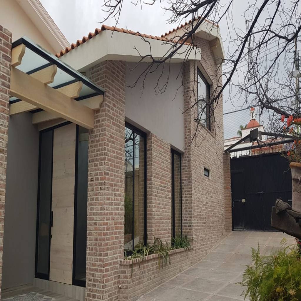 Fachada principal de rivera arquitectos ecléctico ladrillos | homify