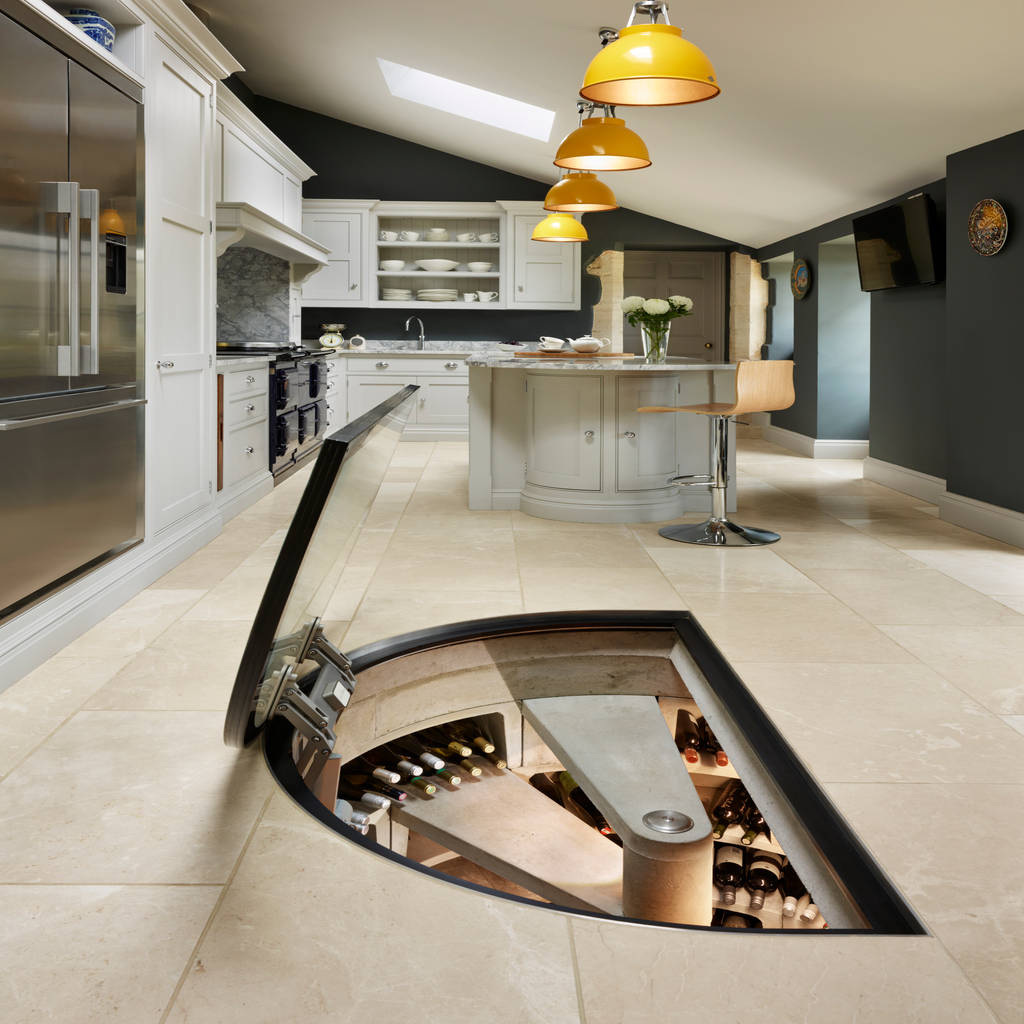 Original spiral cellar with half round glass door spiral cellars modern