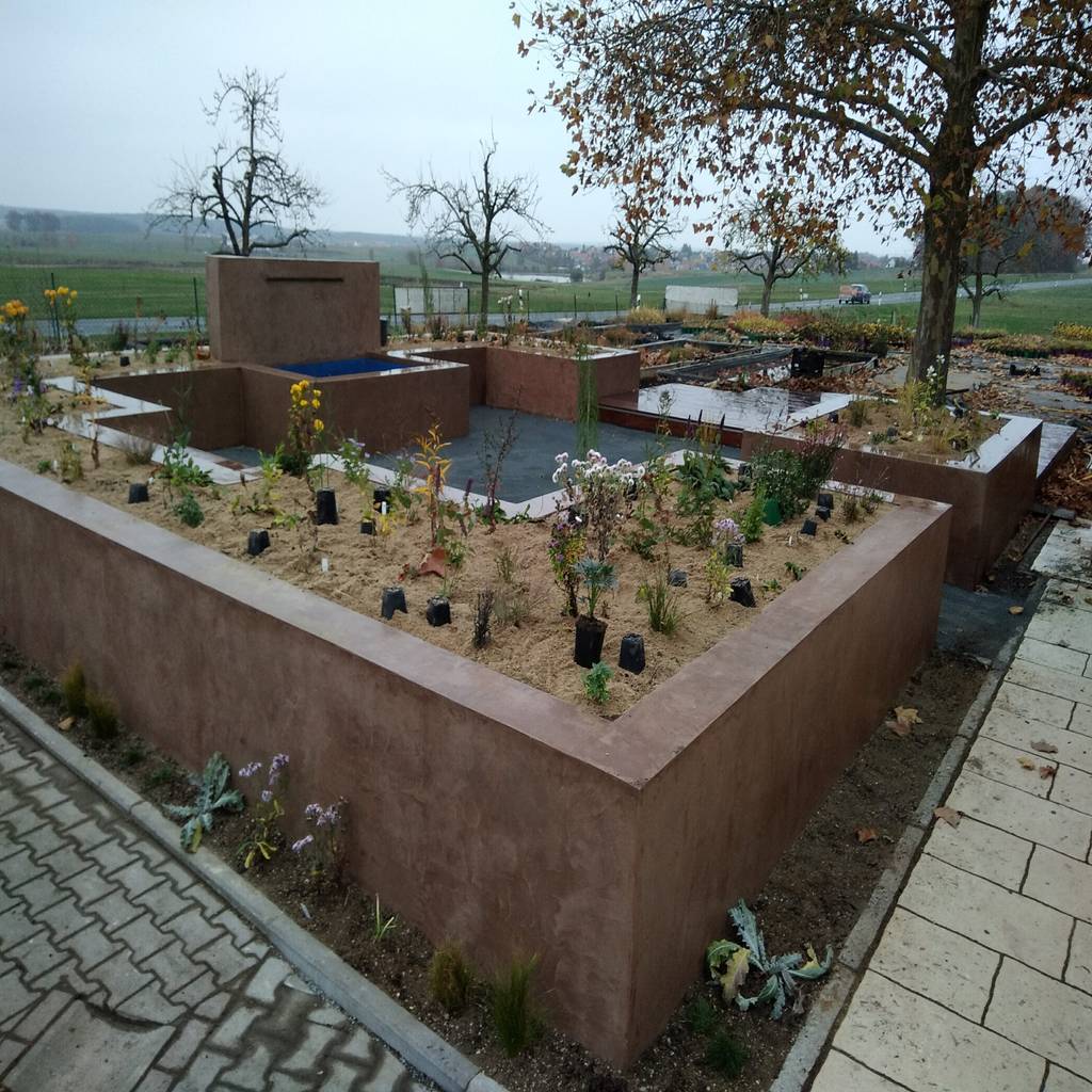 Sitzplatz mit hochbeeten und wasserfall neues gartendesign by wentzel