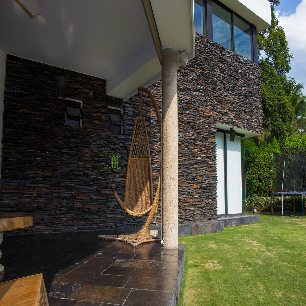 Fachada en piedra piña negra óxido voral piedra casas de campo piedra