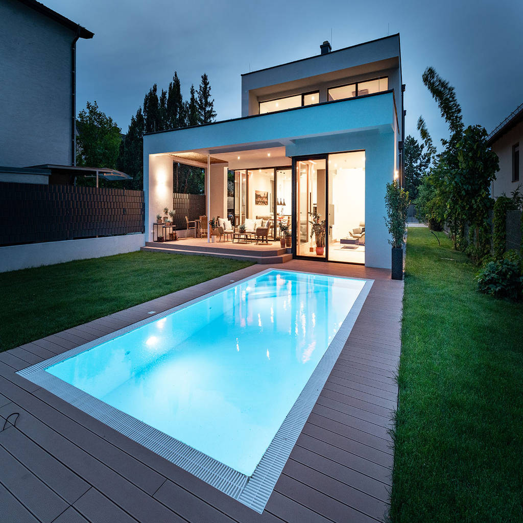 Modernes massivhaus in himberg gartenseite moderne pools von al