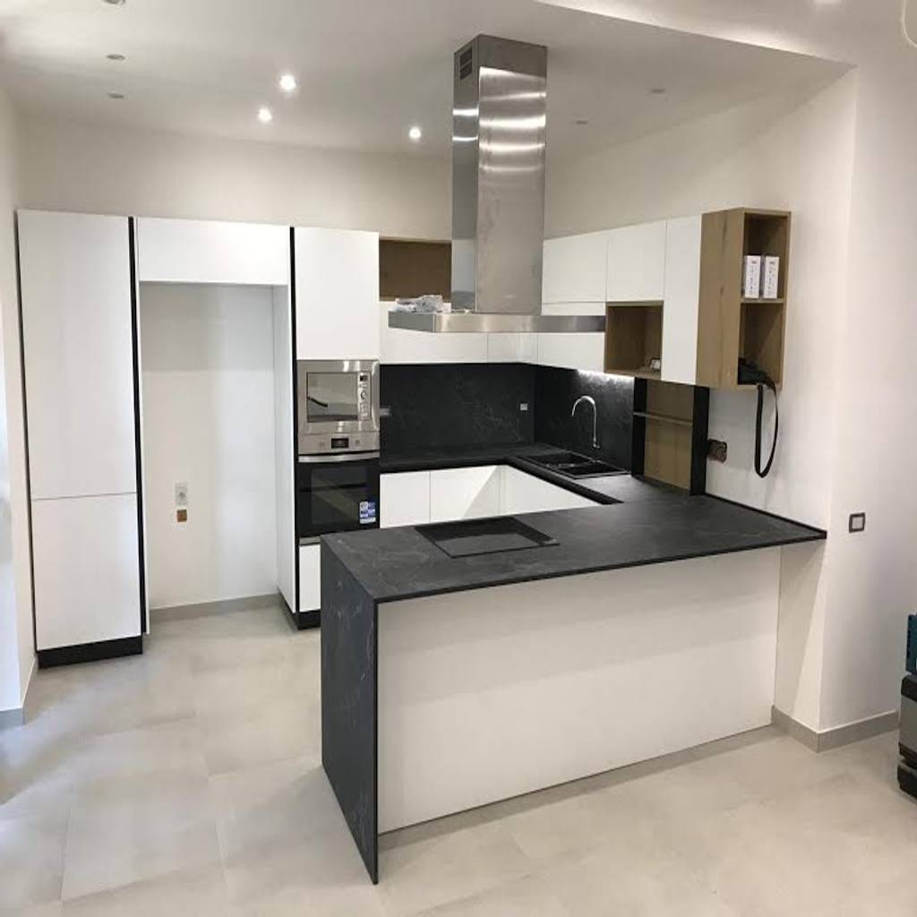 Cucina con cappa a isola di l&m design di marelli cinzia ...