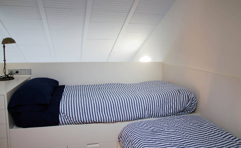 Dormitorio bajo cubierta xmas arquitectura e interiorismo para reformas