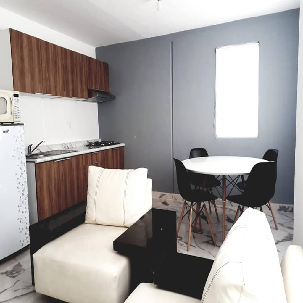 Espacio abierto sala, comedor, cocina de crearquitectura moderno | homify