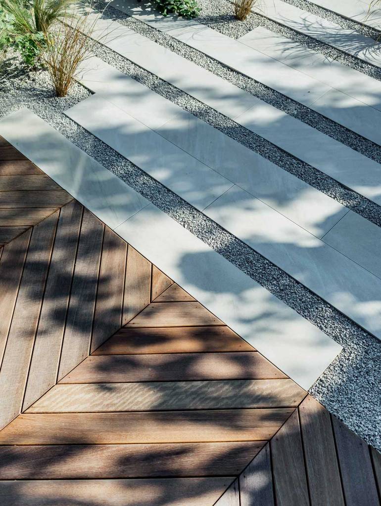 Timber deck interface to natural stone paving | homify