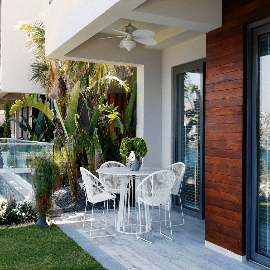 Summer house in bodrum's bay opens to the pleasures of life .
