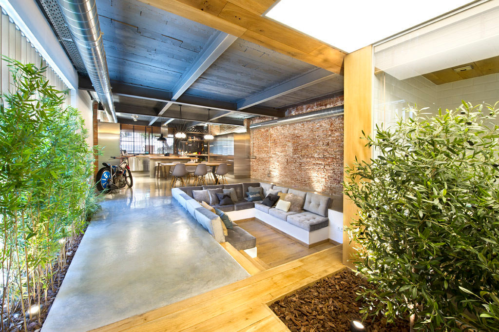 Bajo comercial convertido en loft (Terrassa), Egue y Seta Egue y Seta Rustic style living room