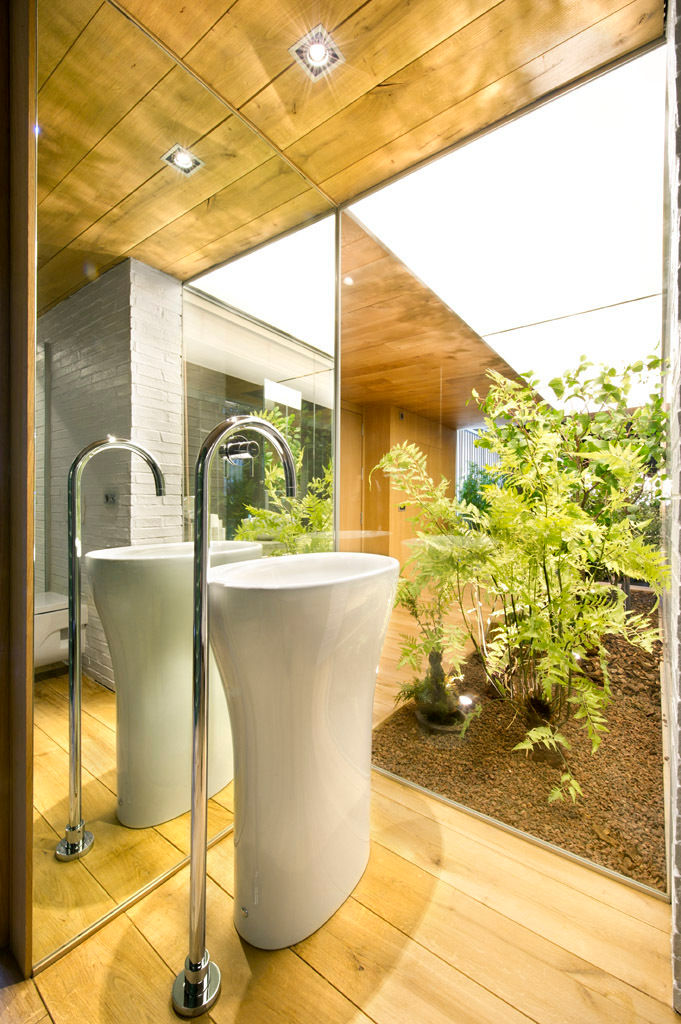 Bajo comercial convertido en loft (Terrassa), Egue y Seta Egue y Seta Rustic style bathrooms