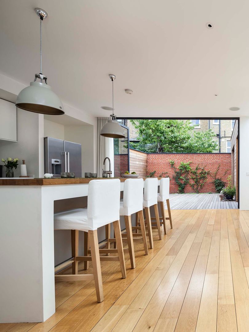 A single-storey Courtyard House: East Dulwich , Designcubed Designcubed مطبخ