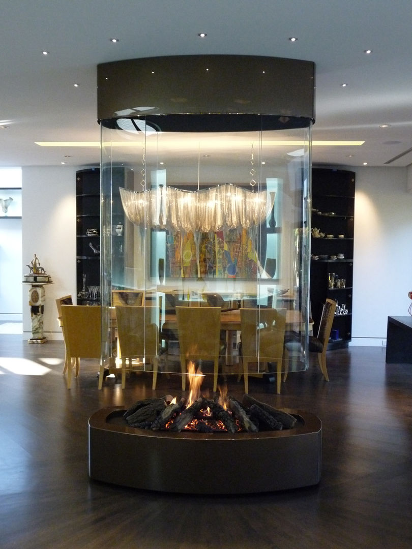 Oval free hanging glass fireplace, Bloch Design Bloch Design غرفة المعيشة ديكورات مدفأة الحطب